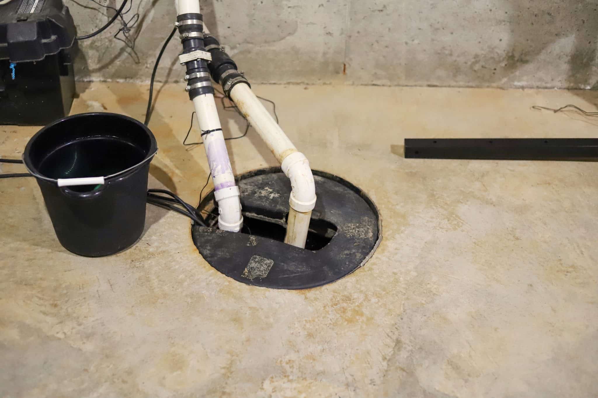 A sump pumps in a home basement.