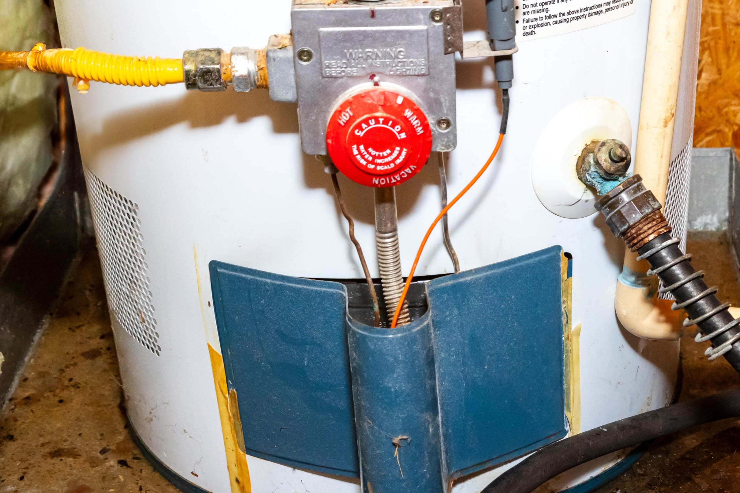 Old water heater, Water Heater Needs Replacing.