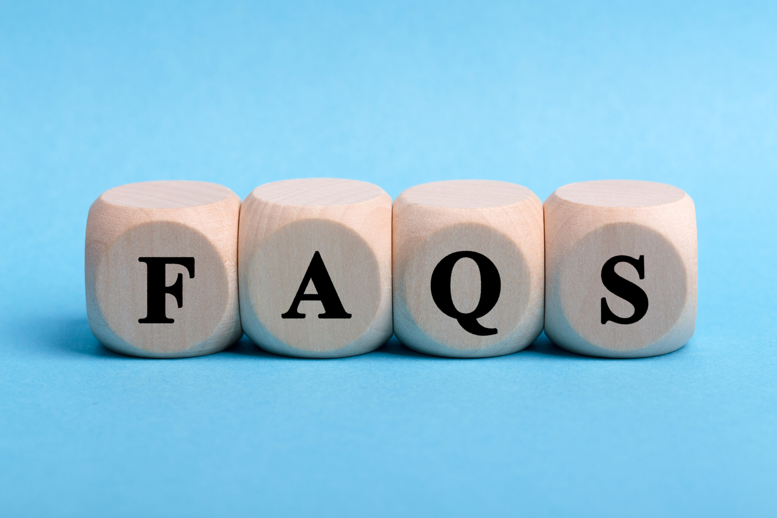 FAQS Text Wooden Blocks isolated, Integrated Plumbing Automation Systems.