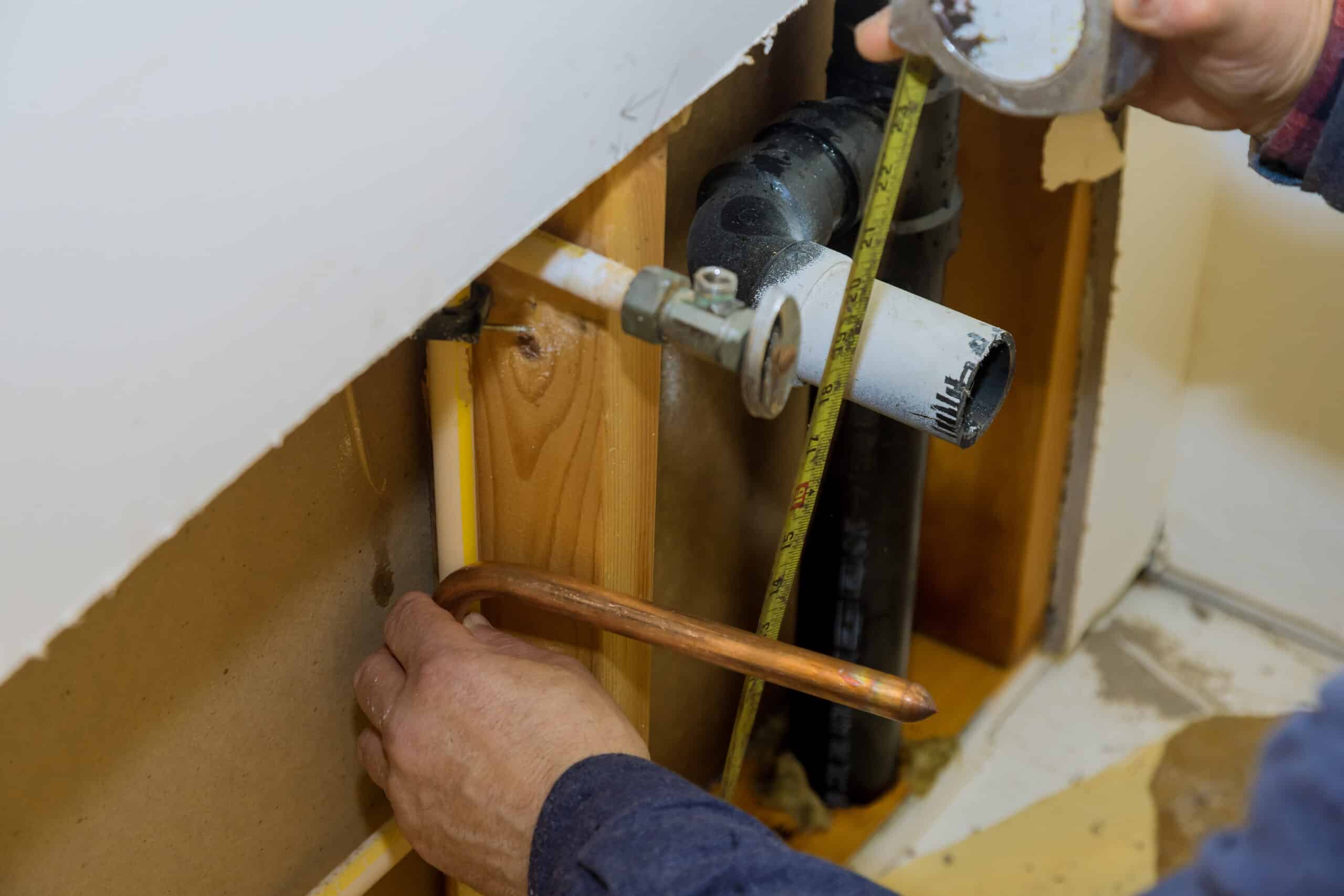 Home bathroom in repair of plastic polypropylene water pipes, Bath remodel rough ins.