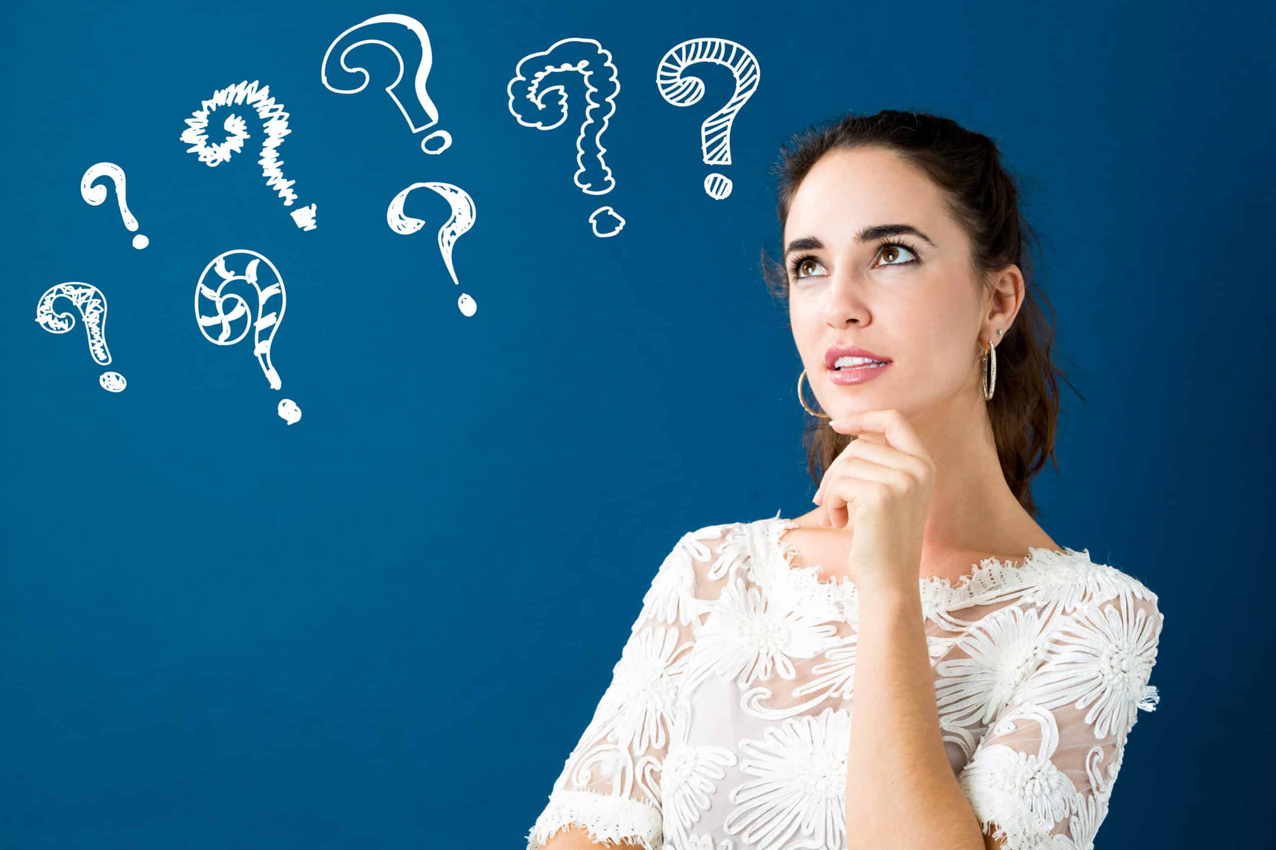 Young woman in a thoughtful pose with question marks, Icemaker Line Install.